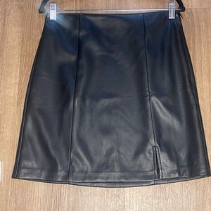 NWT Loft black pleather mini skirt. Never worn. Lined with slip.